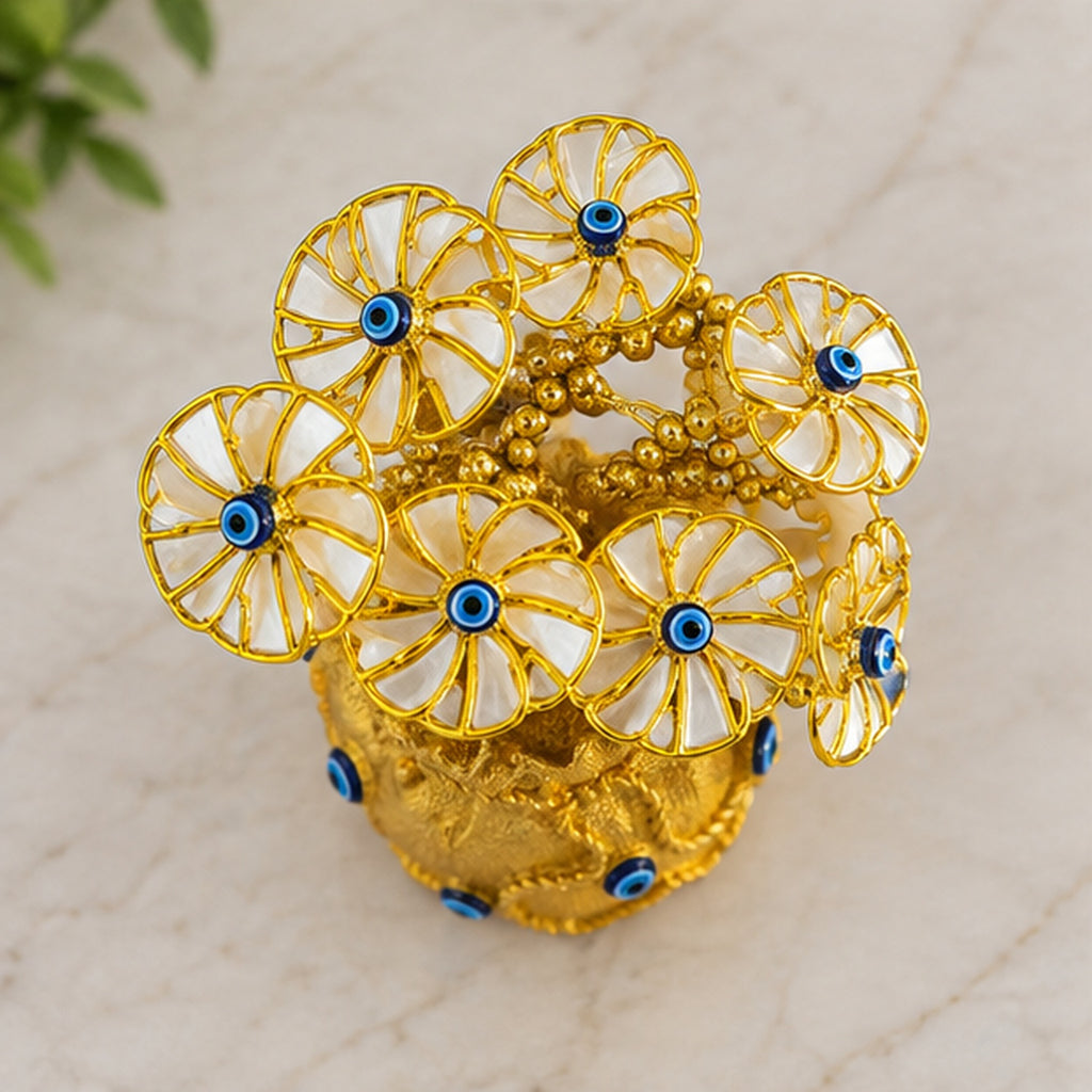Golden Evil Eye Potli Showpiece with Decorative Floral Design