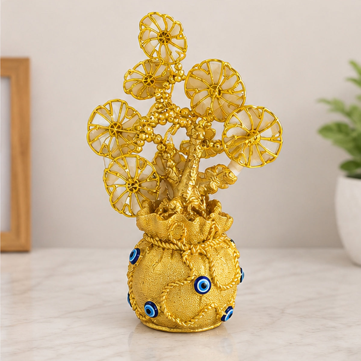 Golden Evil Eye Potli Showpiece with Decorative Floral Design